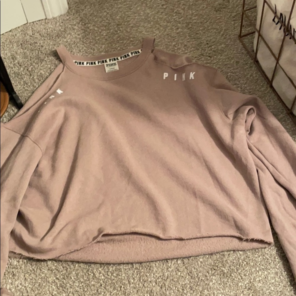 Pink sweater with shoulders cut out